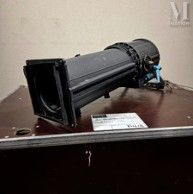 an image of a camera sitting on a table in a room