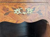 a wooden table with a drawer on top of it