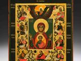 une vieille icône en bois représentant Jésus et des anges