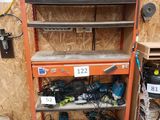 a shelf with tools on it in a garage