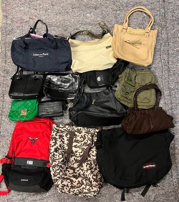 a lot of bags that are sitting on the floor