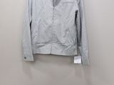 a shirt and jeans on a hanger next to a pair of jeans
