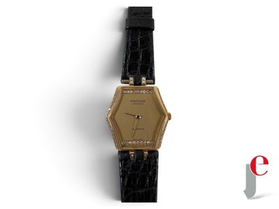 une image représentant une montre en or sertie de diamants