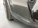 a close up of a car ' s front bumper