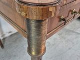 a close up of a table with a drawer on it