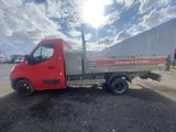 an image of a red truck parked in a parking lot