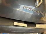 a close up of a car with a sticker on it ' s bumper