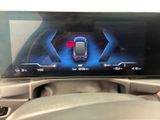 a picture of a car dashboard with a digital display