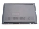 a laptop that is sitting on a white surface