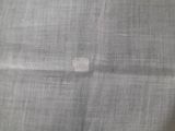 a close up of a piece of fabric with a hole in it