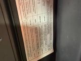 an image of a close up of a gas furnace with a label on it