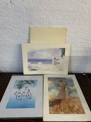 a couple of cards sitting on top of a table next to each other