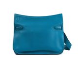 a blue leather shoulder bag on a white background