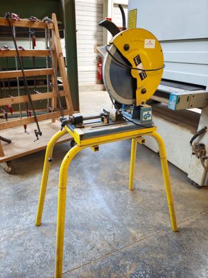 a machine that is sitting on a stand in a garage
