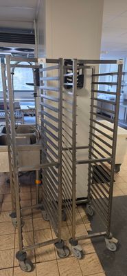 an image of a commercial kitchen with stainless steel racks