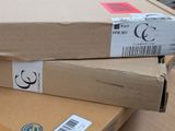 two boxes stacked on top of each other on a table