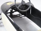 a toy car with a steering and a steering wheel