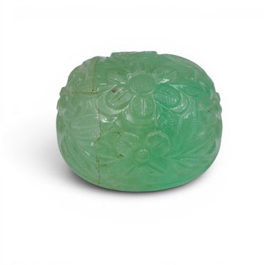 a close up of a green soap on a white surface