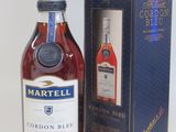 the bottle of martelli cordon blue is next to the box