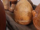 many different types of vases on a shelf