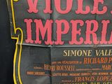 a sign that says violent imperial on the side of a building