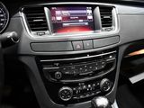 the dashboard of a car with a digital display in the center of it