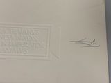 someone is drawing a picture on a piece of paper with a pencil