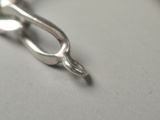 a close up of a pair of scissors on a table