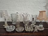 a table with a lot of glass items on it