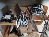 a pile of wires that are sitting on a shelf
