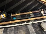 many different types of pipes in the back of a truck
