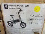 a box with a picture of an electric scooter on it