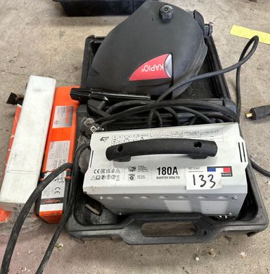 a box of tools that are sitting on the ground