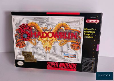une image représentant une boîte sur laquelle figure un jeu, posée sur une table
