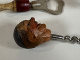 a bottle opener and a corkscrew on a table