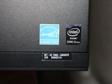 a close up of a computer with a sticker on it