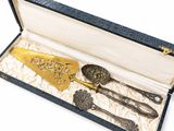 an image of a set of silverware in a blue box