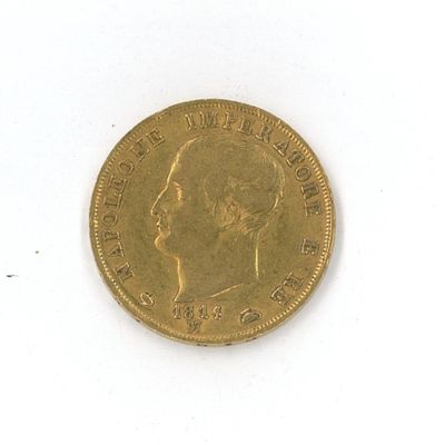 une pièce d'or sur laquelle figure le visage d'un homme