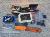 a lot of tools that are laying out on the ground