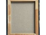a picture of a wooden frame with a linen backing