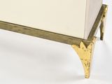 an image of a white and gold chest of drawers on a stand