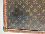 louis vuitton monogramet canvas case with leather trim
