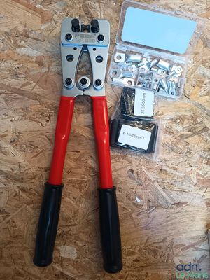 a pair of pliers that are laying on a table