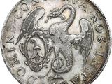 un gros plan d'une pièce d'argent sur laquelle figure un dragon