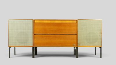an image of a wooden cabinet with two speakers on top of it