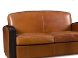 a brown leather couch with black legs on a white background