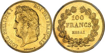 a gold coin with the image of a man ' s head on it