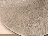 a close up of a large metal object on a table