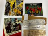 quelques vieux livres sont posés les uns à côté des autres sur une table