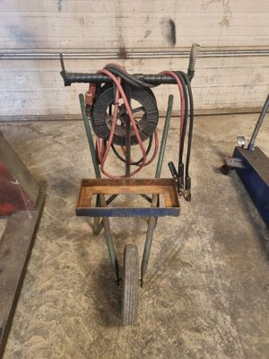 une image représentant un chariot auquel est fixé un tuyau